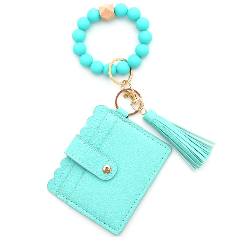 Porte-cartes avec bracelet porte-clés à perles et pompon