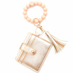 Porte-cartes avec bracelet porte-clés à perles et pompon