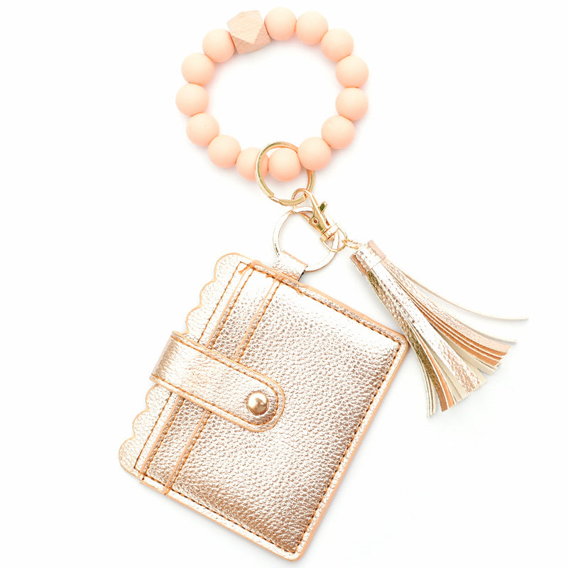 Porte-cartes avec bracelet porte-clés à perles et pompon