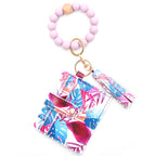 Porte-cartes avec bracelet porte-clés à perles et pompon