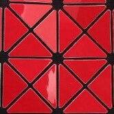 SAC À MAIN À CARREAUX GEOMETRIQUE PLIÉ