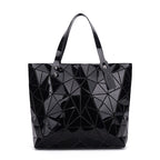 SAC À MAIN À CARREAUX GEOMETRIQUE PLIÉ