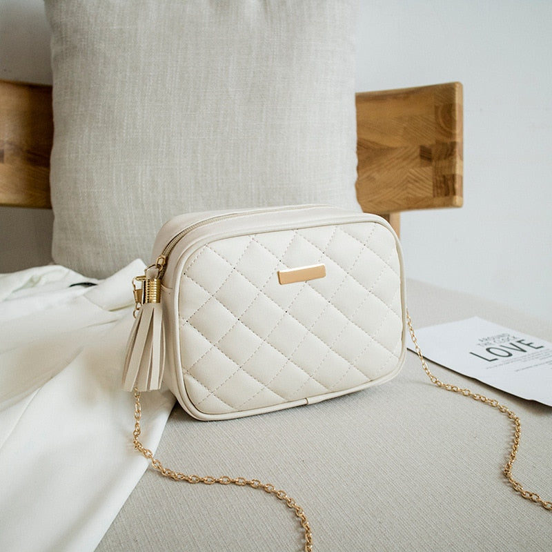 SMALL MESSENGER BAG WITH TASSELS