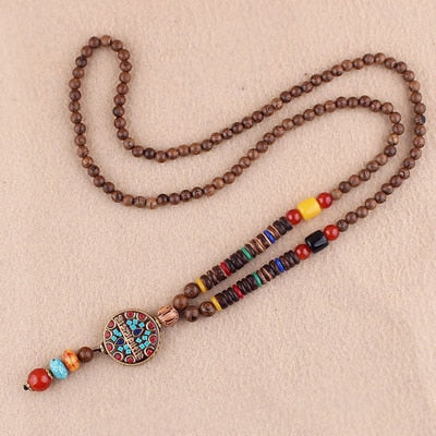 LONG PEARL PENDANT AND NECKLACE IN MALA WOOD 