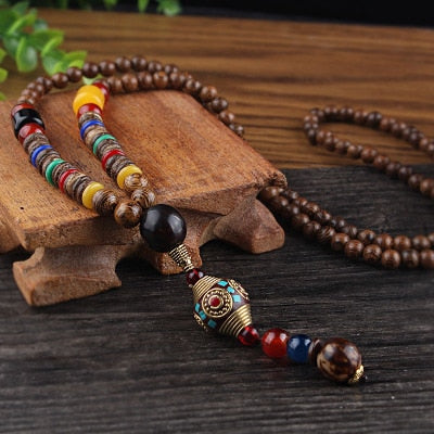 LONG PEARL PENDANT AND NECKLACE IN MALA WOOD 