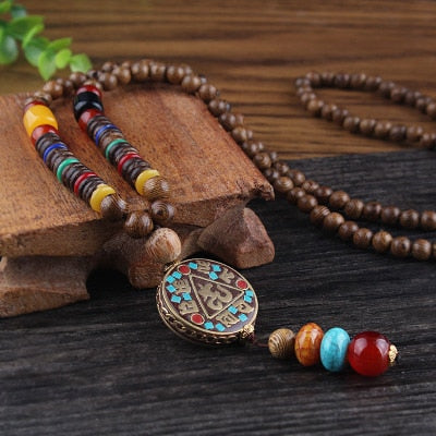 LONG PEARL PENDANT AND NECKLACE IN MALA WOOD 