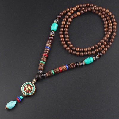 LONG PENDENTIF ET COLLIER PERLÉS EN BOIS DE MALA