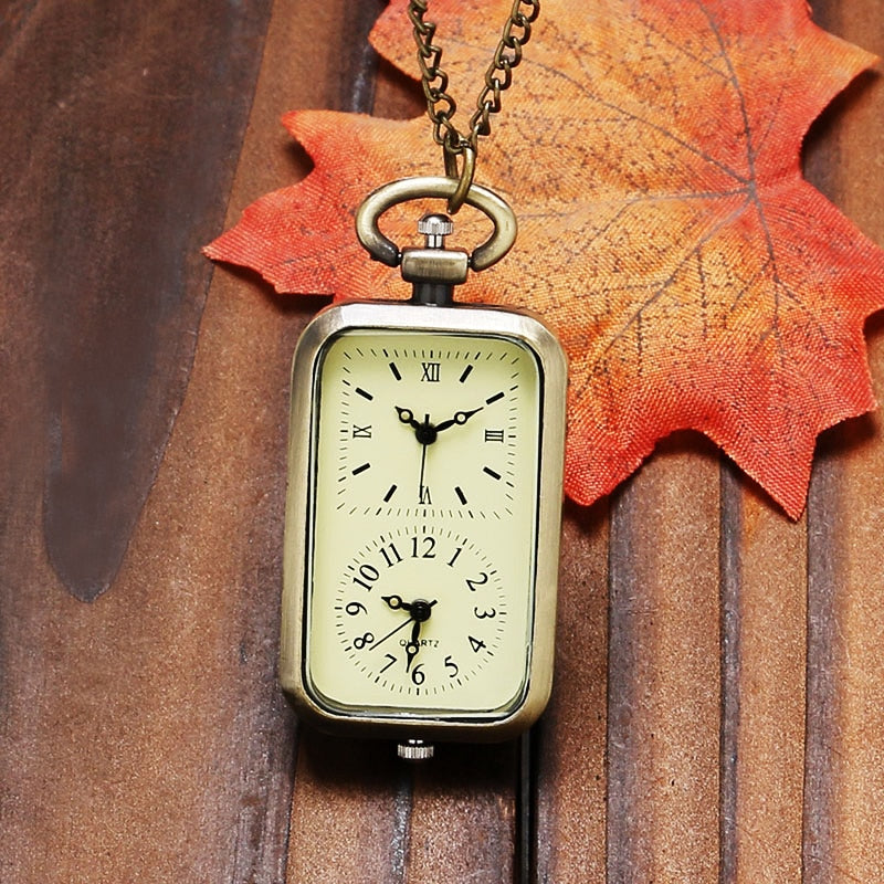 MONTRE DE POCHE RECTANGULAIRE EN BRONZE