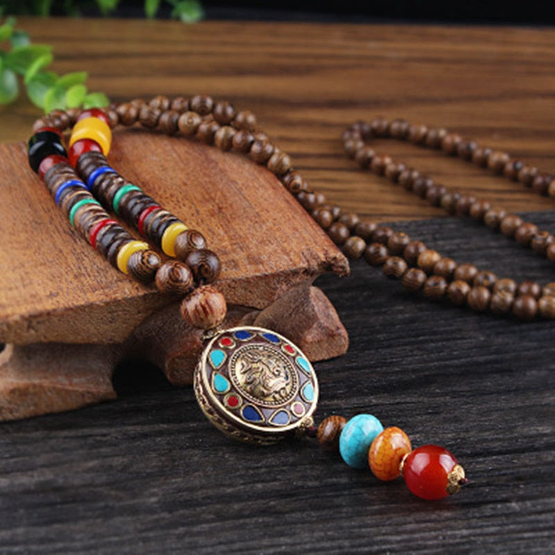 LONG PEARL PENDANT AND NECKLACE IN MALA WOOD 