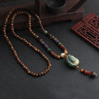 LONG PEARL PENDANT AND NECKLACE IN MALA WOOD 