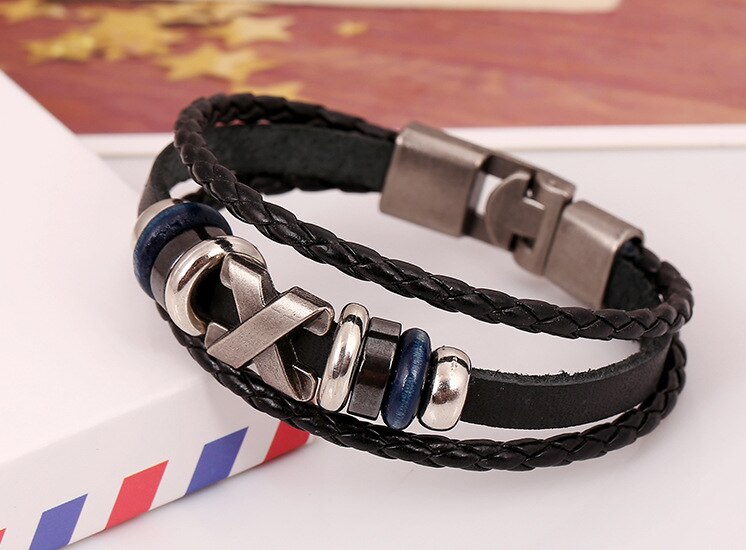 BRACELET EN CUIR TRESSÉ