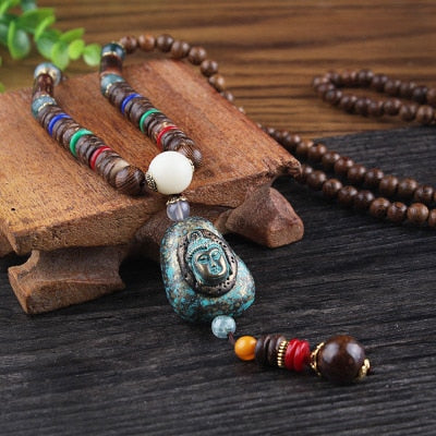 LONG PEARL PENDANT AND NECKLACE IN MALA WOOD 