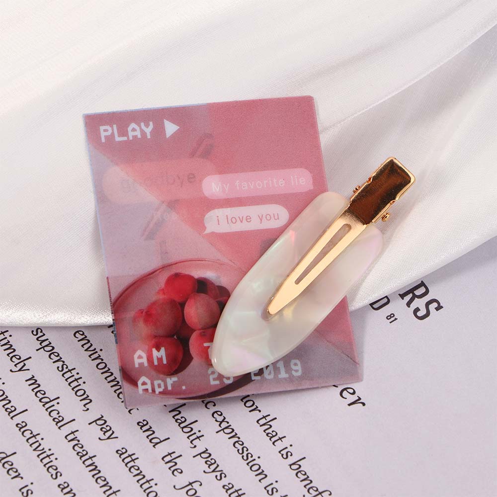 SEAMLESS HAIR CLIP 