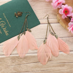 BOUCLES D'OREILLES BOHEMIENNES EN PLUMES - BOSSOUASHOP
